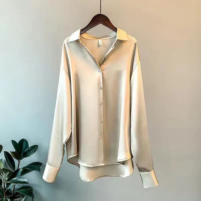 Chic women's satin long-sleeve blouse. Elegant & versatile top, perfect for both office wear and stylish casual outfits.