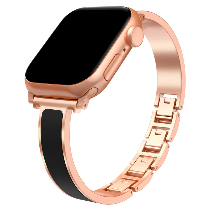 Stylish Apple Watch cuff band in durable stainless steel with intricate enamel detailing, a modern tech accessory.