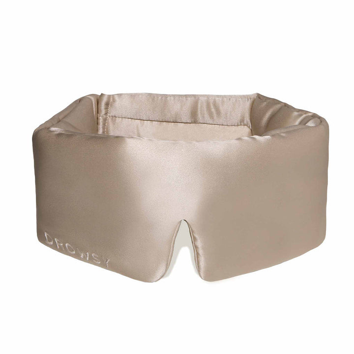 Smooth silk eye mask for skin care, hair protection, and enhanced relaxation during sleep.