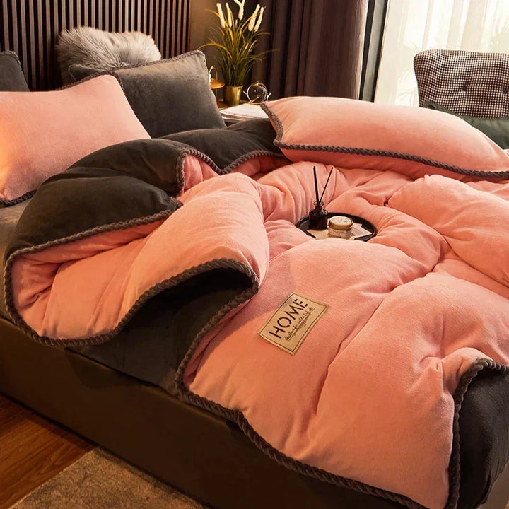Bedroom featuring a stylish velvet fleece comforter set, enhancing decor with plush, warm comfort.