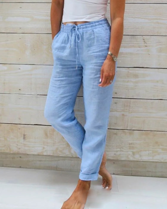 Luxurious women's cotton linen trousers. SereneComfort straight leg pants, breathable for all-season casual wear.