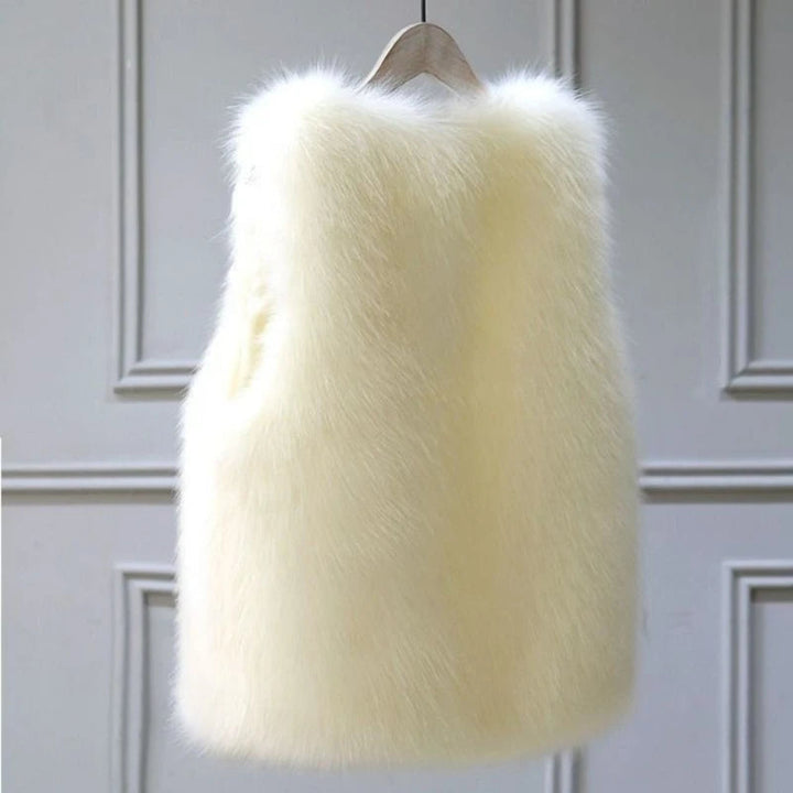 Soft, warm women's winter vest. Stylish sleeveless jacket offering cozy comfort and elegant outerwear.