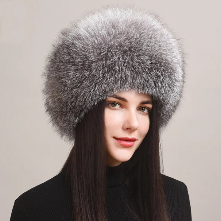 Elegant women's genuine fox fur hat, a stylish and warm accessory designed for ultimate cold weather comfort.