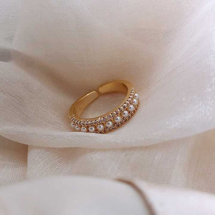 Stylish gold pearl ring for women. This luxury women's jewelry piece is an elegant gift, perfect for special occasions.