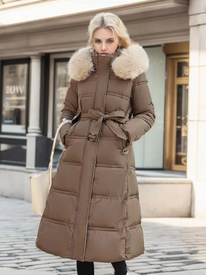 Luxurious women's long parka coat, an elegant winter jacket for ultimate warmth & style. Perfect for cold weather.