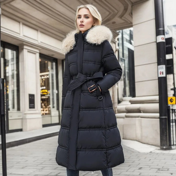 Ladies' luxurious long parka jacket, an essential for warm & stylish winter outerwear. Perfect for cold weather.