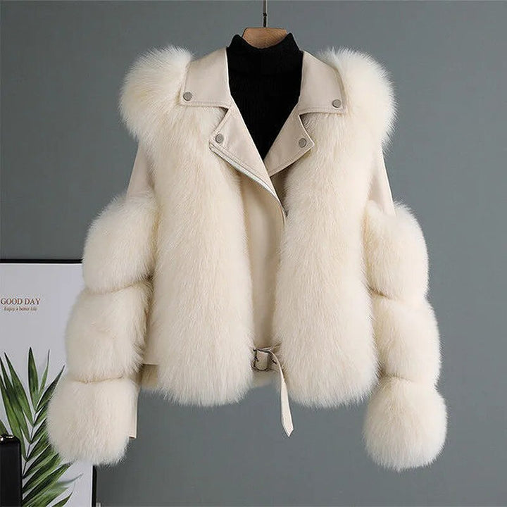 Warm women's luxury winter coat, perfect for cold weather. Elegant style, relaxed fit for winter fashion.
