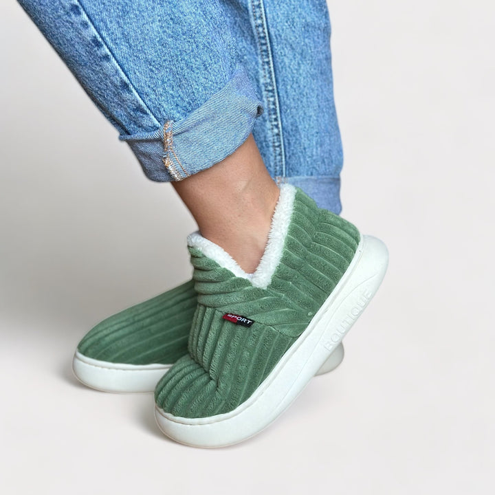 Soft, comfortable women's indoor slippers, perfect for winter loungewear and home comfort.