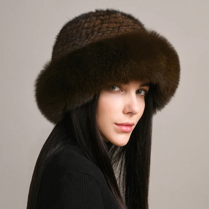 Cozy women's winter hat for cold weather, a stylish and warm luxury accessory for any outfit.