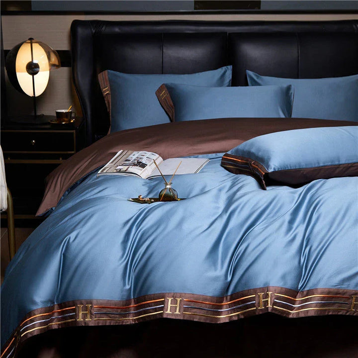 Luxury 4-piece satin bedding set. Soft, smooth duvet cover, sheet set, & pillowcases for ultimate bedroom comfort.