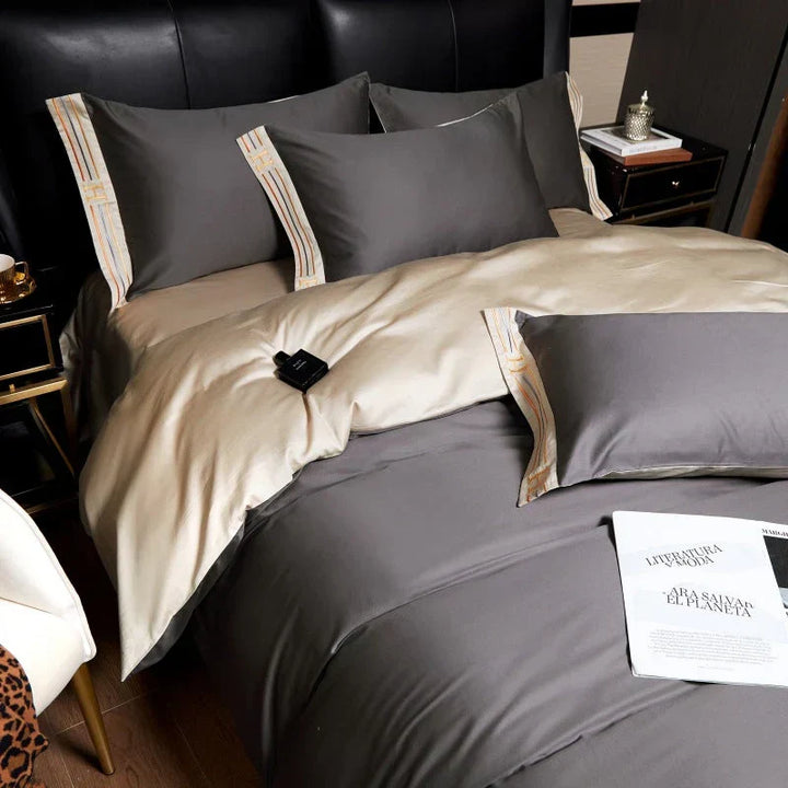 Luxurious satin pillowcases (2), complementing a 4-piece bedding set. Soft comfort for your bedroom oasis.