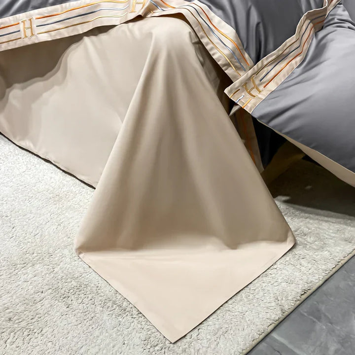 Neatly folded 4-piece luxury satin bedding set. Ready to bring soft, smooth comfort & elegance to any bedroom.