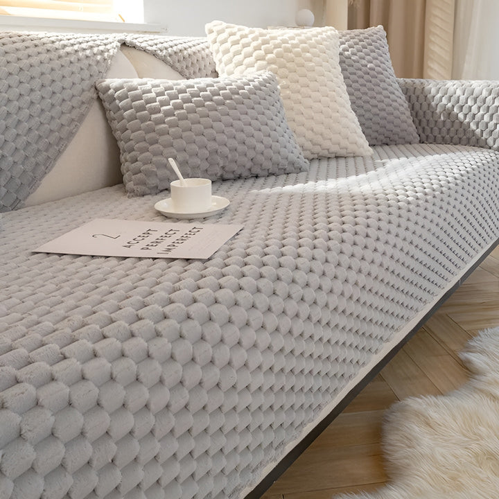 Gray modern velvet sofa cover, stretch slipcover offering luxurious furniture protection for any living room.