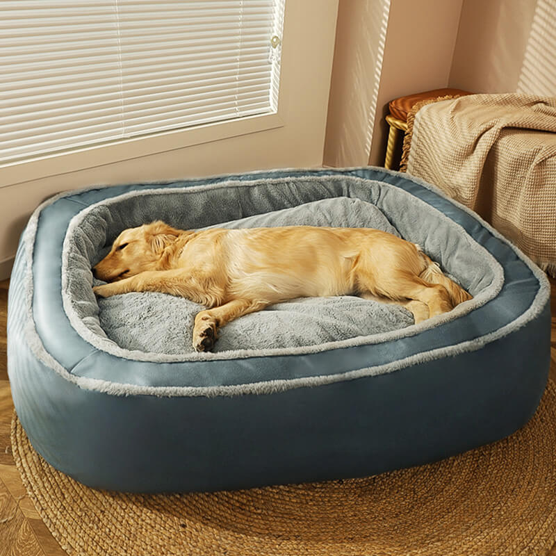 Luxury dark blue dog bed with a soft, cozy removable cover for ultimate pet comfort. Washable and durable.