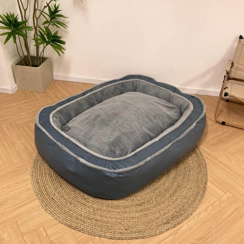 Plush, cozy dark blue dog bed with a soft removable cover, offering ultimate comfort for small or large pets.