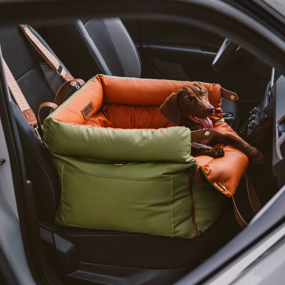 Premium dog booster seat, comfortable and secure for car journeys.