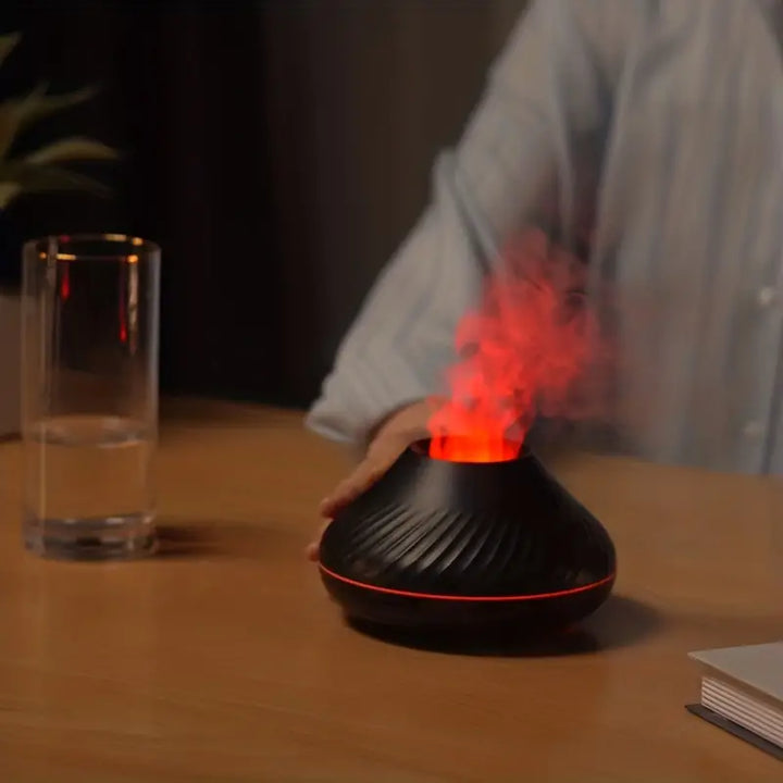 Luxe LumoMist flame effect diffuser in a cozy living room, providing soothing aromatherapy & a tranquil glow.