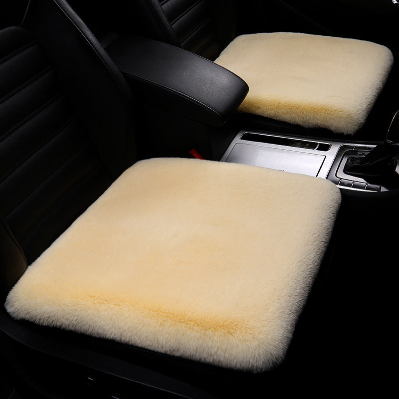 Authentic sheepskin wool cushion, a versatile accessory for luxury comfort in any setting.