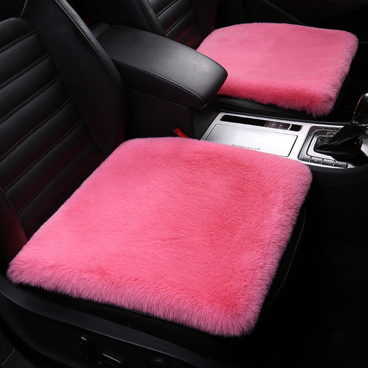 Soft, non-slip sheepskin cushion. Perfect car seat cover, office chair pad, or home accent.