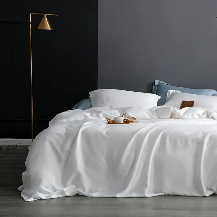Elegant silk duvet cover, hypoallergenic & temperature regulating bedding.