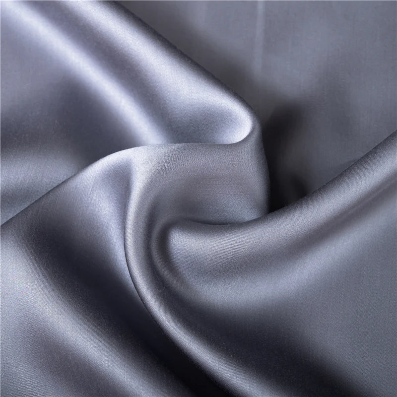 Pure natural silk duvet cover, hypoallergenic and breathable for restful sleep.