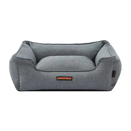 Plush luxury dog bed with removable, washable cover for easy cleaning & pet comfort.