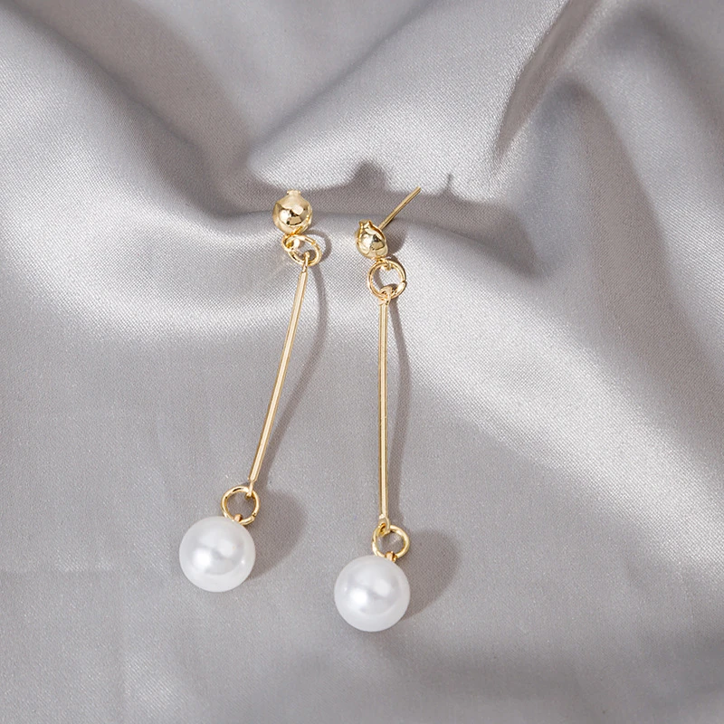 Exquisite Selena luxury design pearl drop earrings for women. Timeless and elegant accessory, a perfect gift for her.