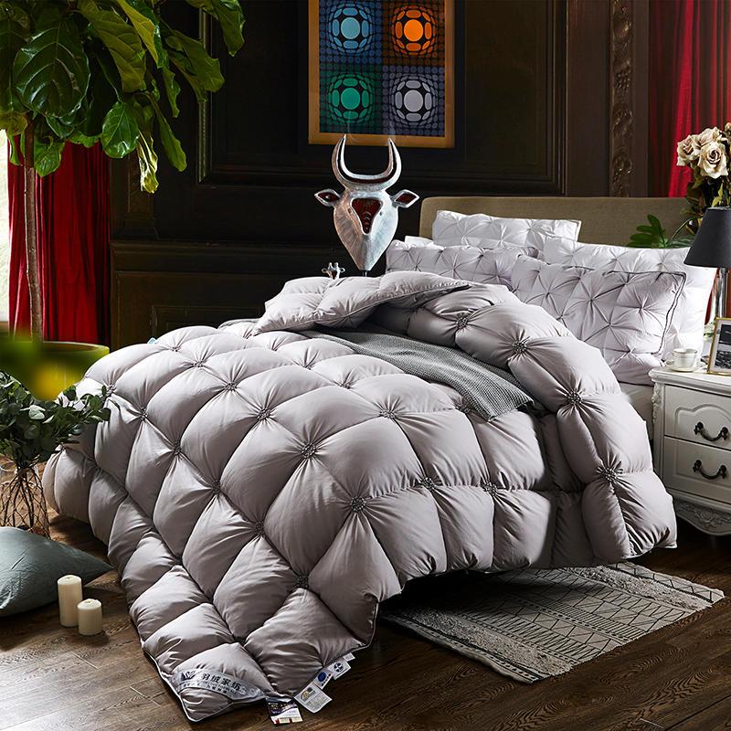 Fluffy PlumeLux 100% goose down duvet, soft, warm, quilted for luxurious all-season bedroom comfort.