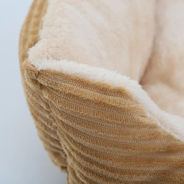 Cozy non-slip dog bed, plush & soft, offering secure pet comfort. Ideal for small or large pets.