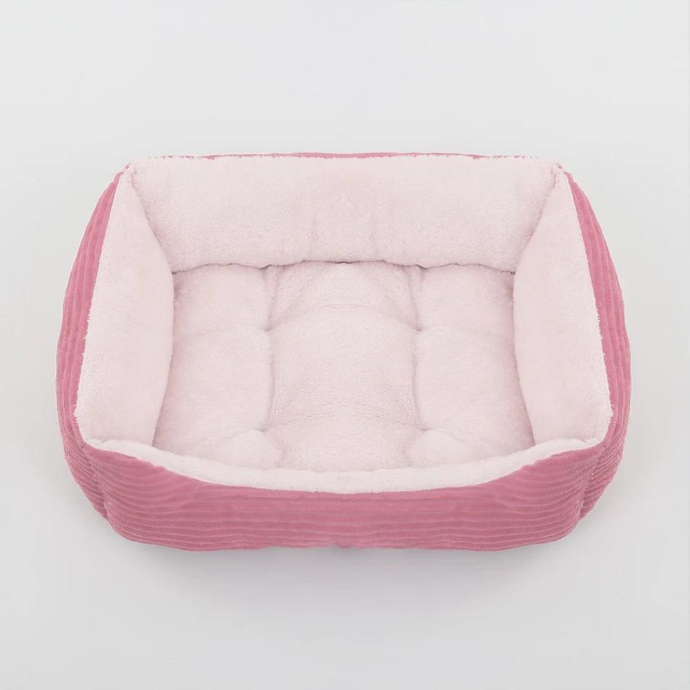 Plush pet comfort dog bed, available for small & large dogs. Soft, washable, & cozy.