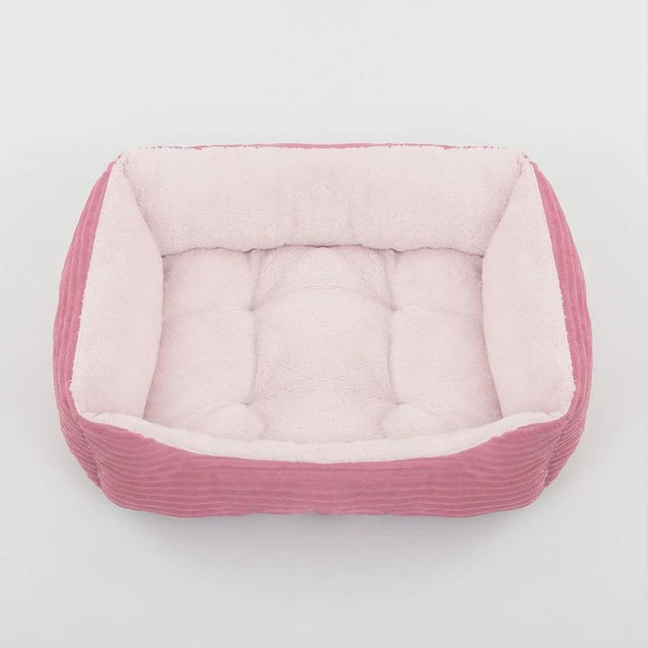Plush pet comfort dog bed, available for small & large dogs. Soft, washable, & cozy.