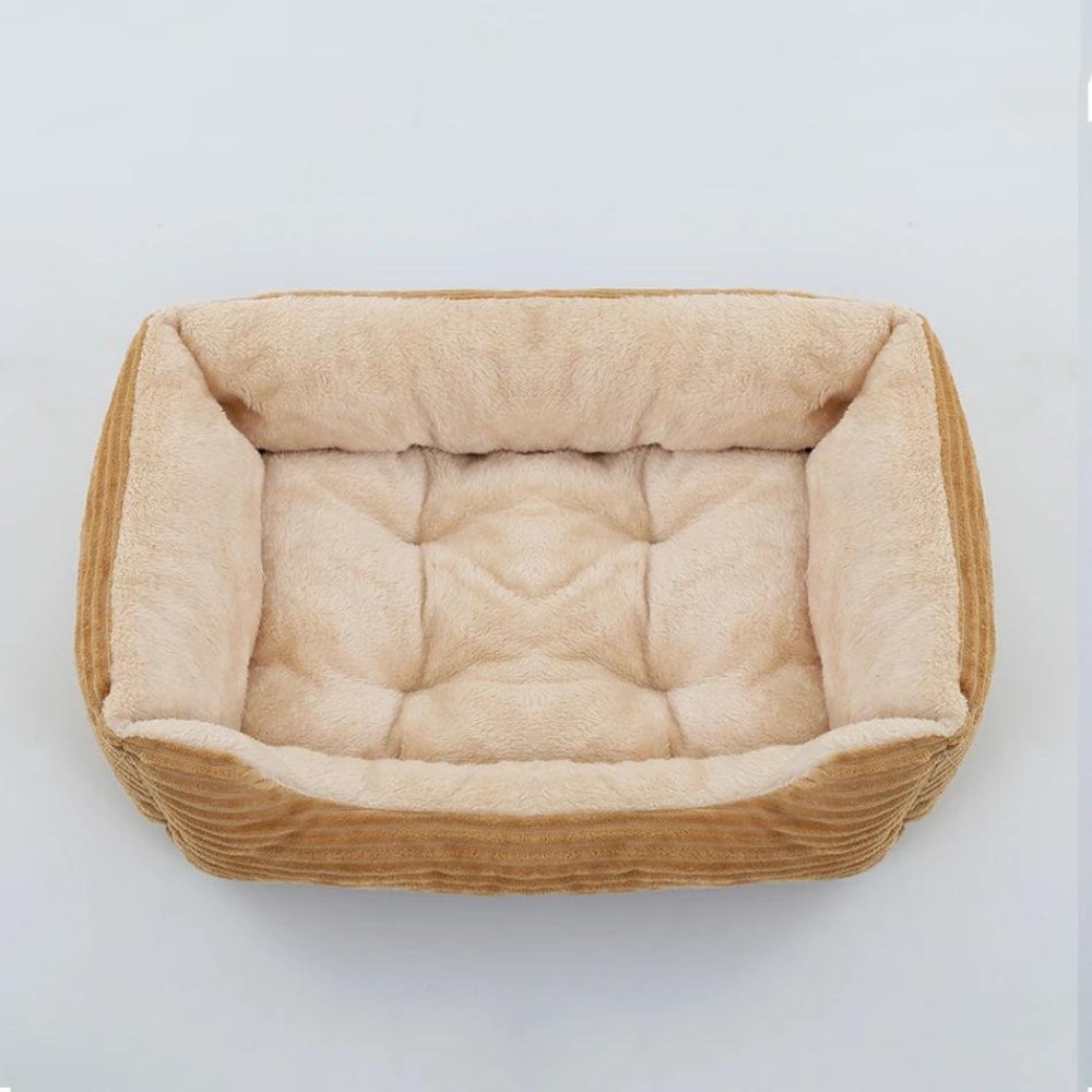 Soft plush dog bed, washable & non-slip. Provides cozy comfort for all pets.