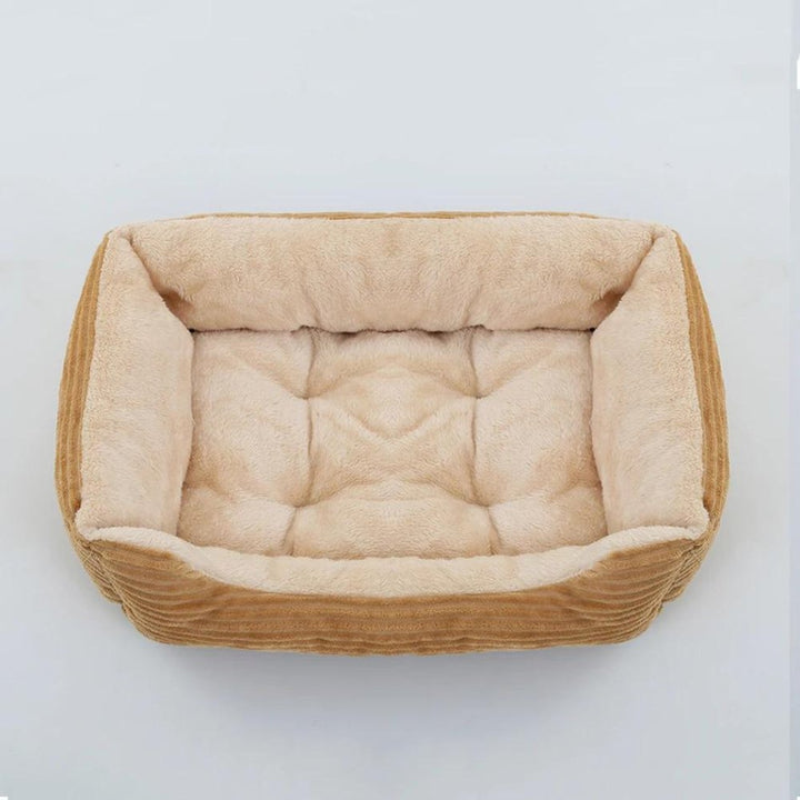 Soft plush dog bed, washable & non-slip. Provides cozy comfort for all pets.