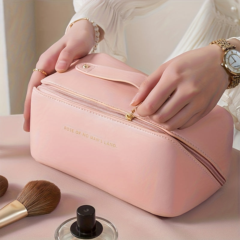Portable PU leather toiletry bag with spacious interior, great for women's makeup and travel needs.
