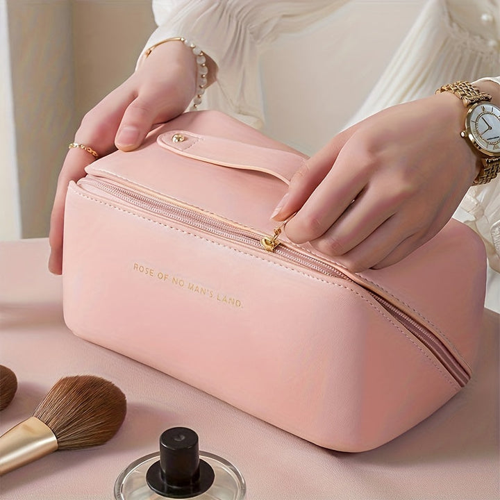 Portable PU leather toiletry bag with spacious interior, great for women's makeup and travel needs.