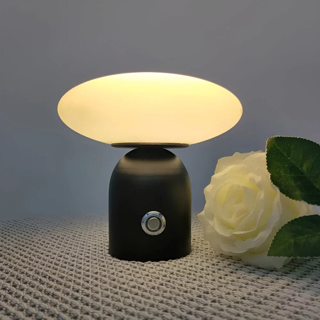 Luxury Scandinavian black mushroom table lamp with smart touch. Modern cordless light for home decor.