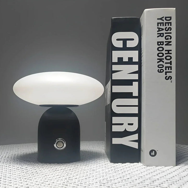 Modern black mushroom lamp. Cordless, smart touch table light. Perfect for luxury Scandinavian home decor.