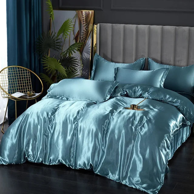Luxury silky satin duvet cover set in deep silver, perfect for an elegant bedroom decor.