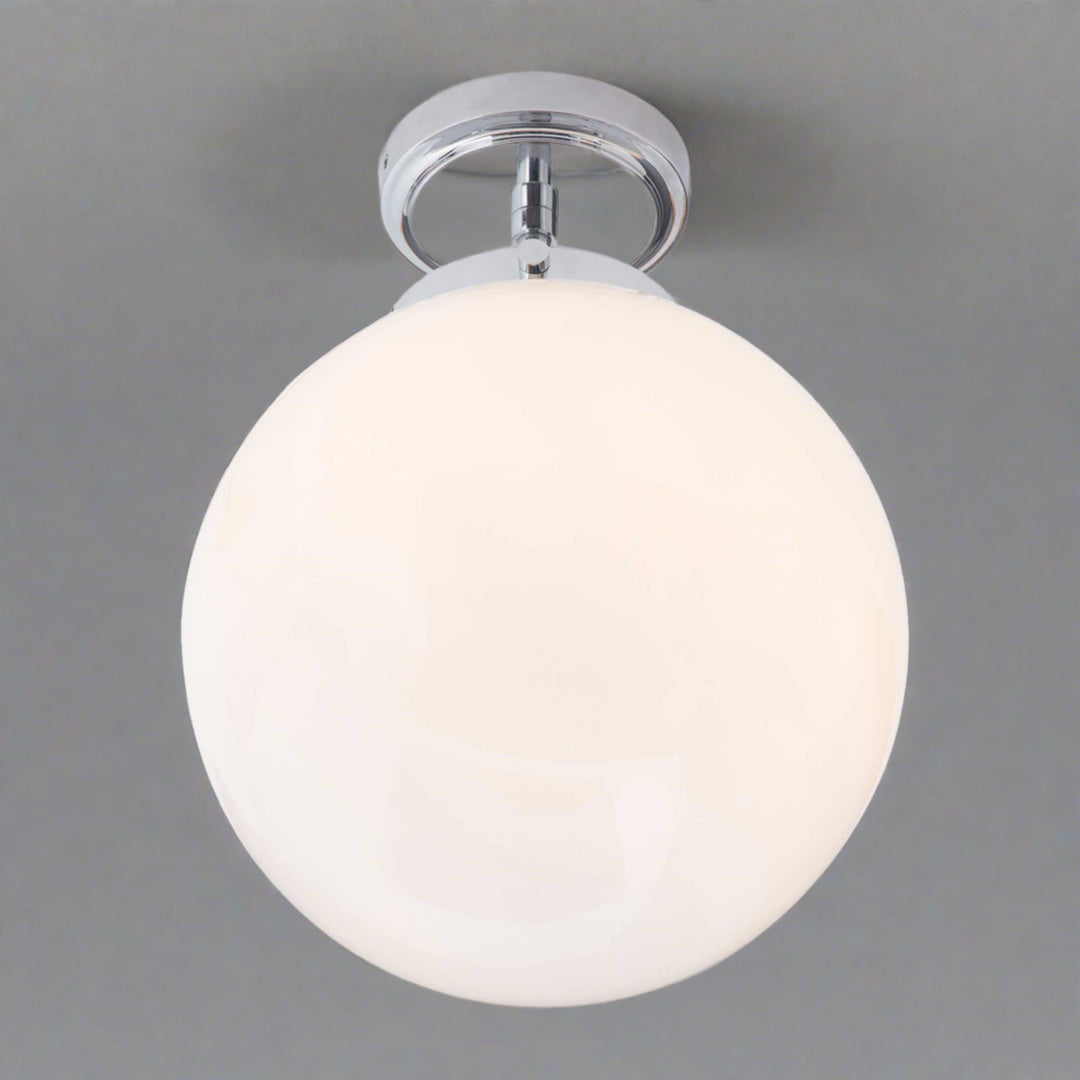 Elegant contemporary spherical LED bathroom ceiling fixture, luxury home decor lighting.