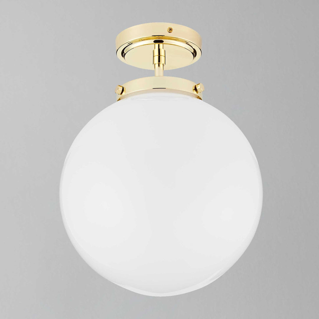 High-end spherical LED ceiling light for bathrooms, modern luxury design, damp rated.