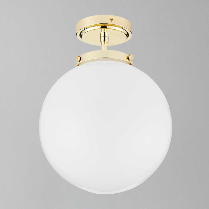 High-end spherical LED ceiling light for bathrooms, modern luxury design, damp rated.
