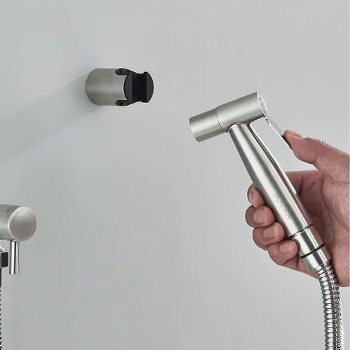 Unisex bidet hand shower with adjustable PureFlow sprayer, perfect for personal hygiene and a clean bathroom.