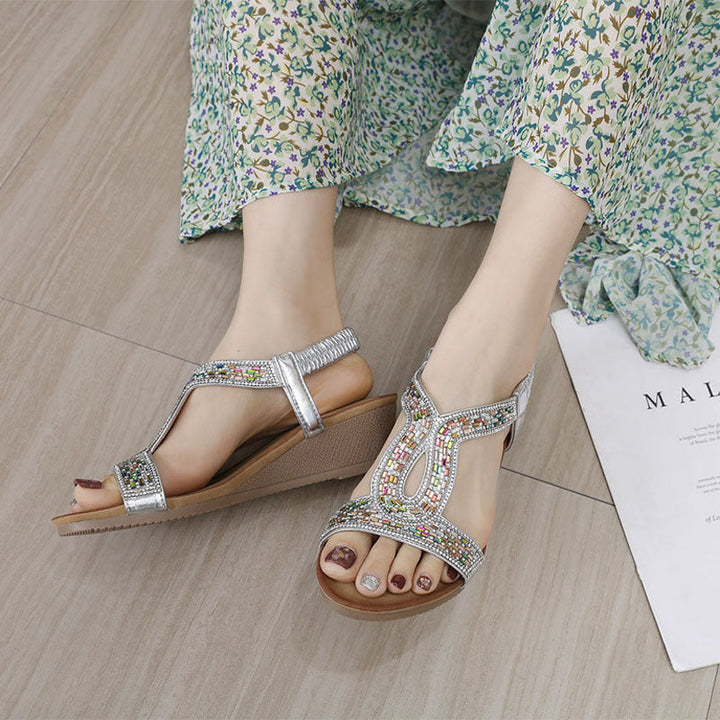 Beautiful women's dress sandals: elegant wedge with eye-catching rhinestone embellishments.