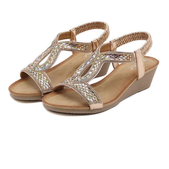Fashion-forward women's rhinestone wedge sandals, ideal for any sophisticated summer ensemble.