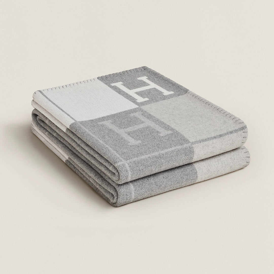 Women's luxury wool cashmere plaid throw, a versatile and stylish blanket for any living space.