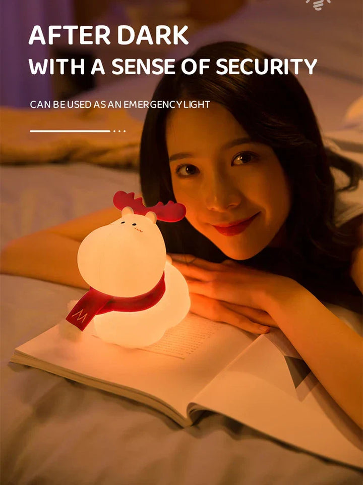 Soft silicone LED reindeer night light for kids. Rechargeable, safe & comforting nursery lamp for bedtime.
