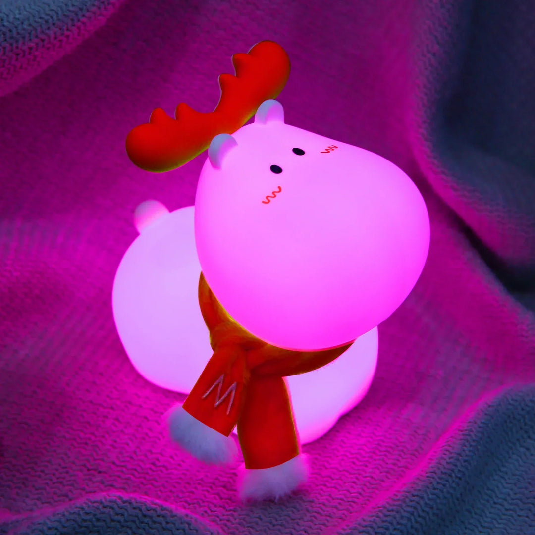 Charming LED reindeer night lamp provides a gentle glow for bedtime. Perfect kids room decor & nursery lighting.
