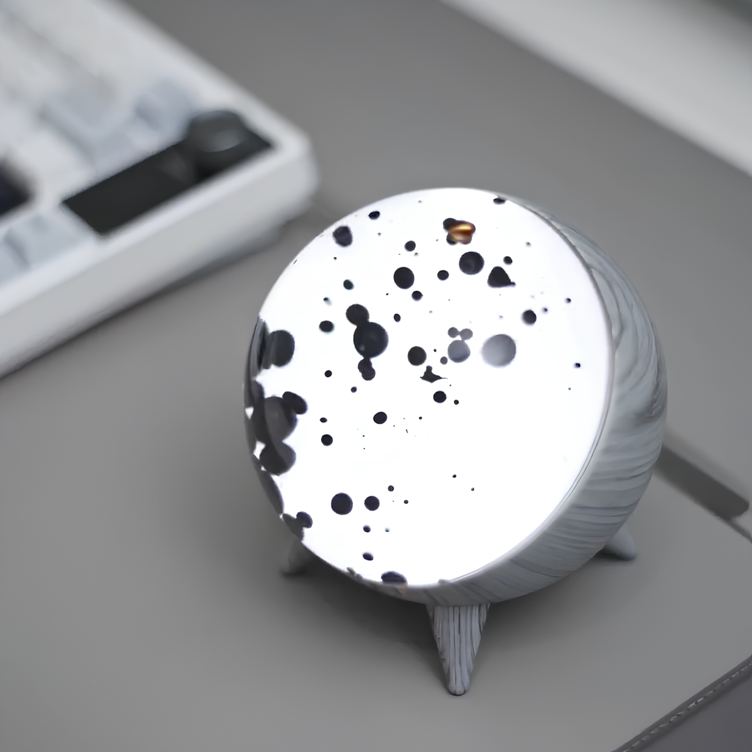 Lifestyle image of MagnePulse ferrofluid display on a desk, enhancing the workspace with unique, interactive decor