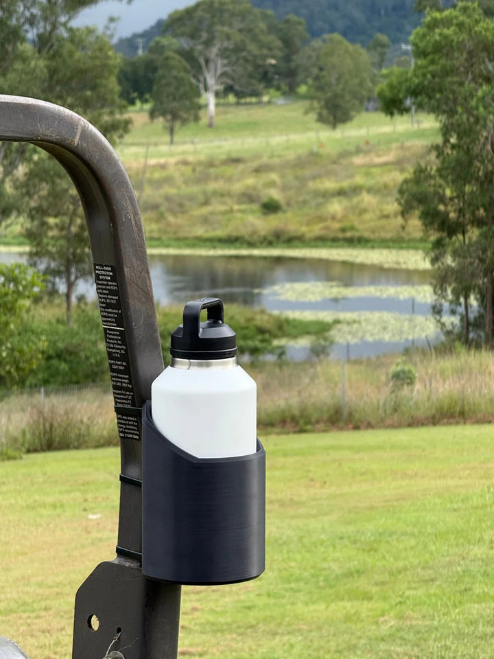 Heavy-duty magnetic bottle mount for toolboxes & gym equipment. Keeps beverages accessible in garage, workshop or gym.