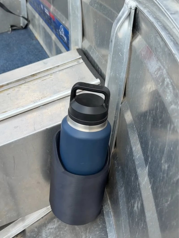 Non-slip magnetic utility holder for drinks. Secure grip for tools, gym, garage. Prevents spills on any metal surface.